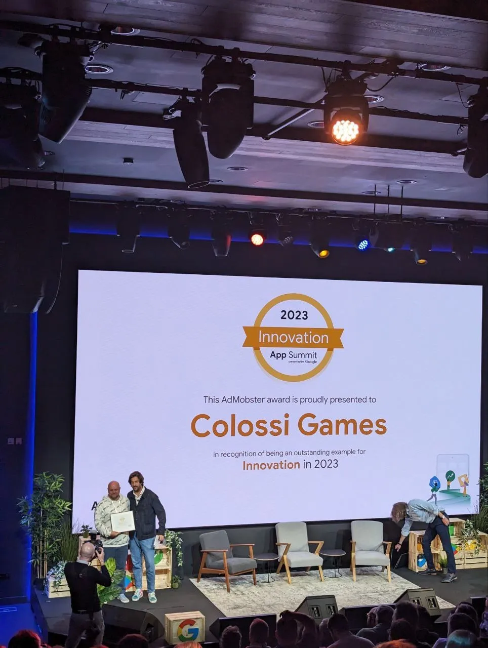 Manuel Prueter on stage receiving the AdMob Innovation Award for Colossi Games at App Summit 2023